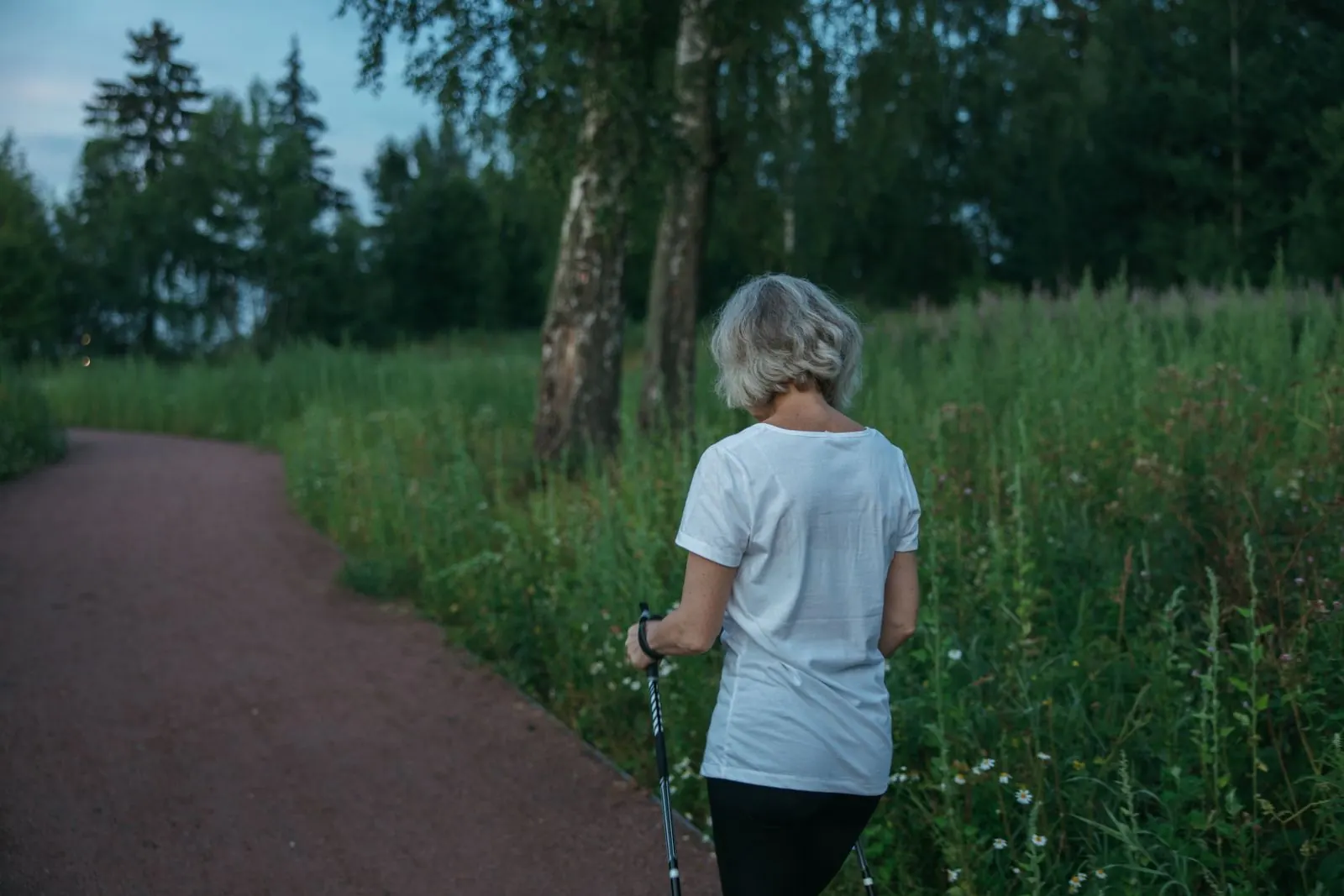 Person walking outdoors on a path